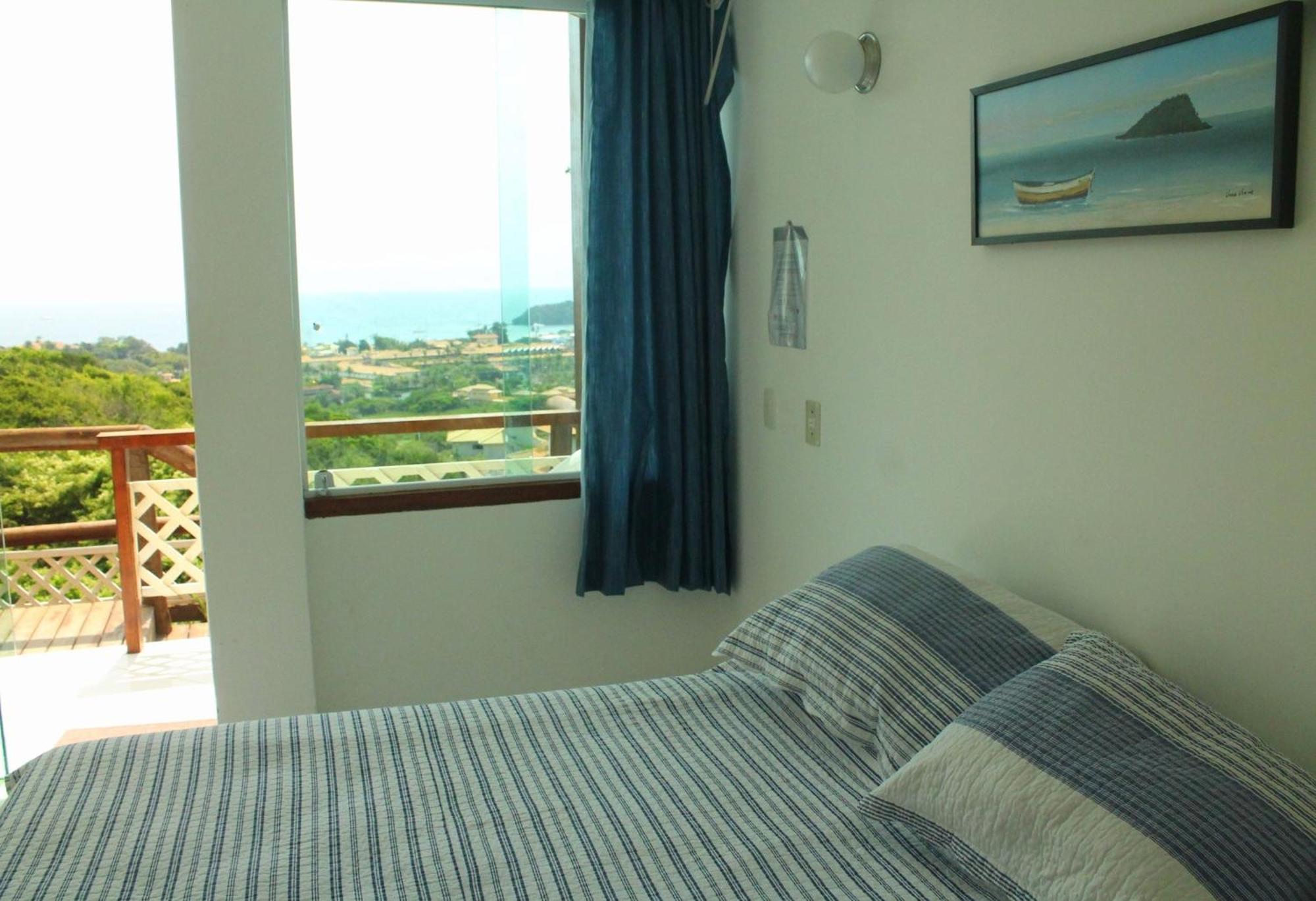 فندق Bella Vista Ocean View Búzios الغرفة الصورة A bedroom in a hotel